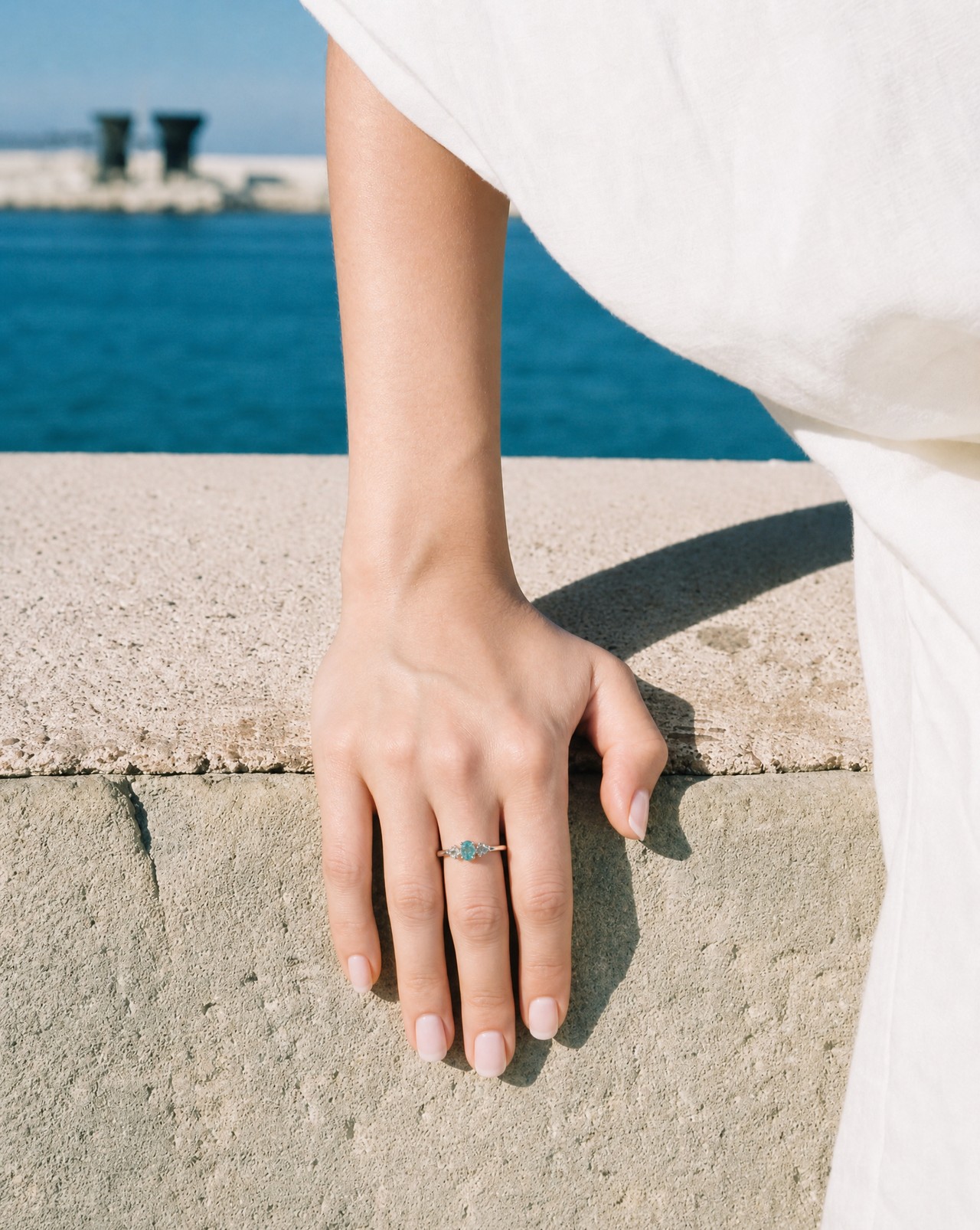 Trilogy Ring w/blue & white Zircon