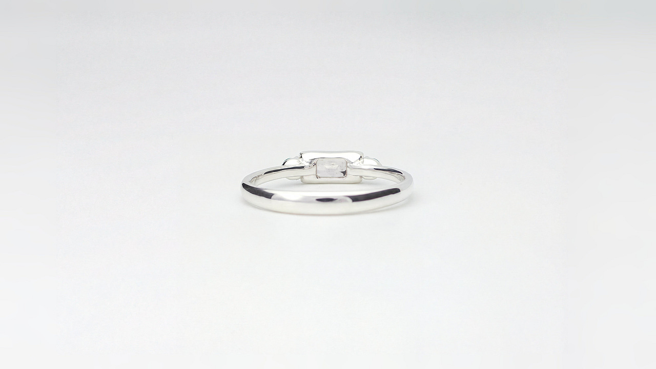 Trilogy Ring with colorless Sapphire and Emerald - view 3