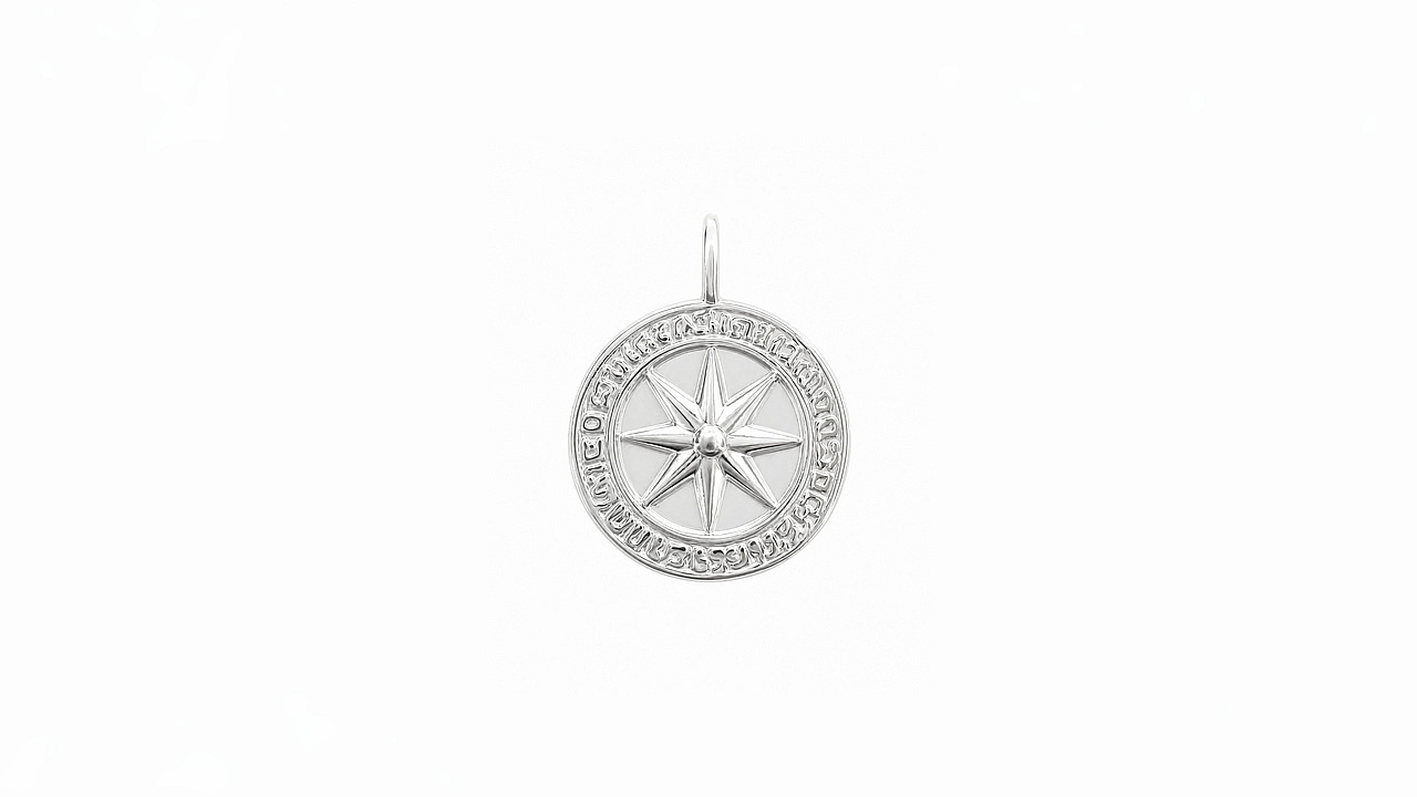Ancient coin pendant Compass
