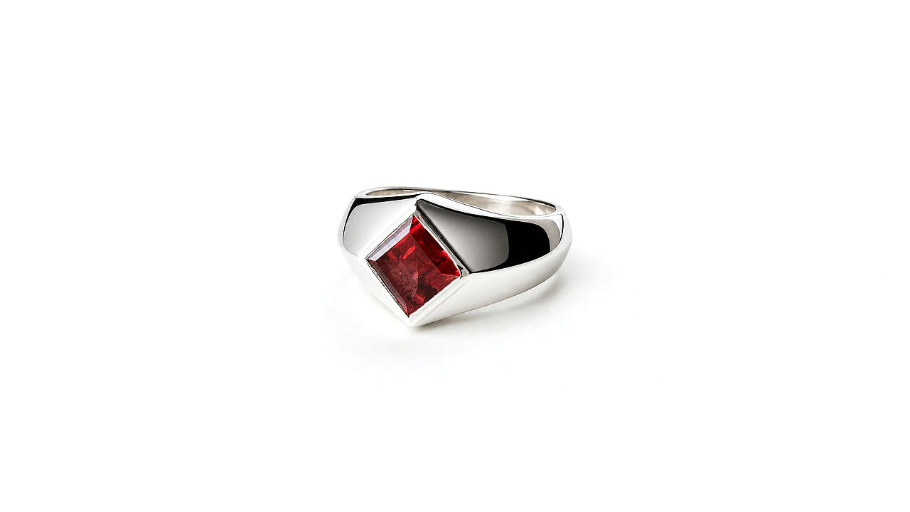 Side view of the ring showing the ridge above the shoulder and the smooth polished flank.